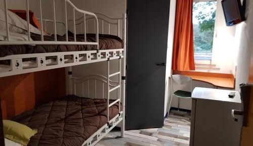 Single Bed in Dormitory Room