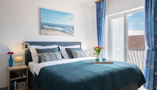 One-Bedroom Apartment with Balcony and Sea View Comfort