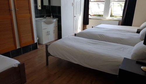 Quadruple Room with Garden View and Private Bathroom