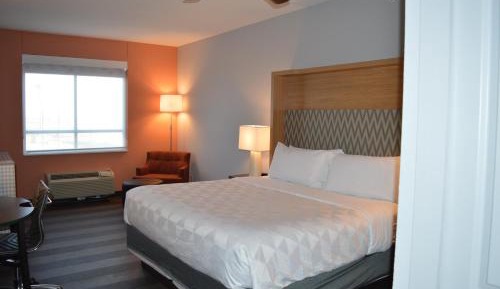 Premium Queen Room with Two Queens and One Sofa Bed