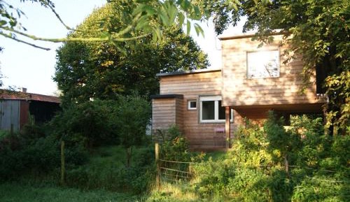 Wooden Cottage with Garden View