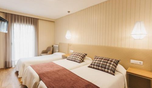 Triple Room (2 Adults + 1 Child)