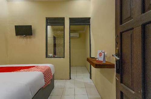 Palangkaraya Hotel | OYO 2527 Hotel Triana