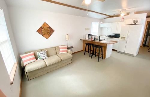 Throckmorton Cottage | Cow Co. Cottages - One Block Away From Downtown Shopping, Dining, & More!