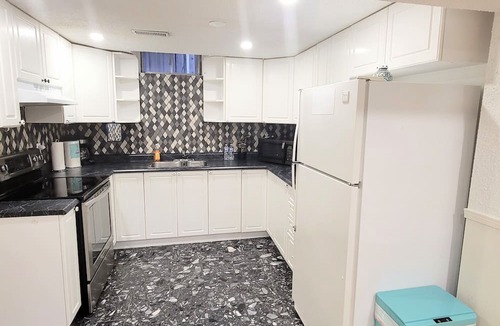 Lisgar House | Private 2-bed basement apartment with kitchen & bath. Shared laundry.