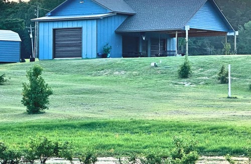 Negreet House | RV Cover with entertaining patio and additional storage area at Toledo Bend Lake