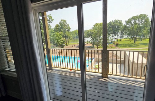Grove House | Giant10-bedroom lakefront home with large pool, hot tub, and dock