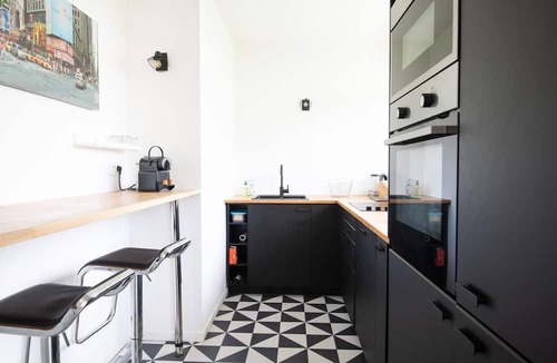 Croix Apartment | Standing apartment lift balcony garden view