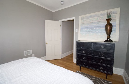 St. Louis Apartment | Charming Urban Cozy Retreat with a fireplace and backyard garden. Pet/Friendly!