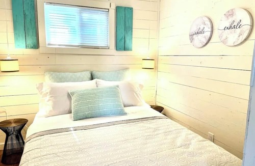 Westmeath Cottage | The Little Blue Beach House waterfront with shallow and sandy beach dog friendly