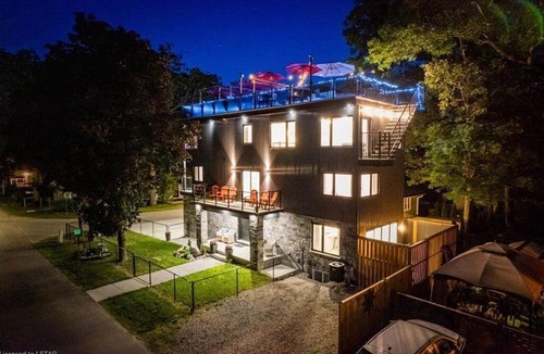 Grand Bend Ski Chalet | Beachfront rooftop patio, hot tub, sleeps 14, 2 BBQ, private new house