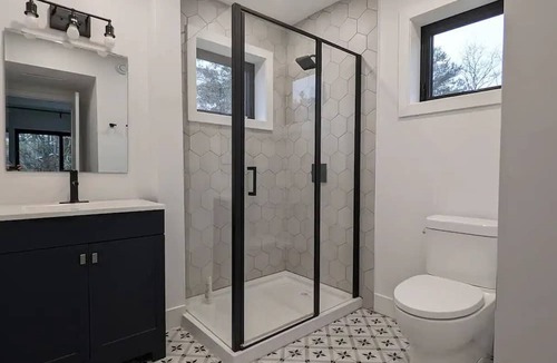 Lafontaine Cottage | Modern Cozy Container Home with Close Proximity to Multiple Beaches