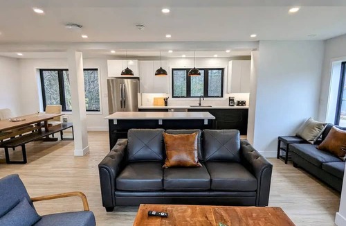 Lafontaine Cottage | Modern Cozy Container Home with Close Proximity to Multiple Beaches