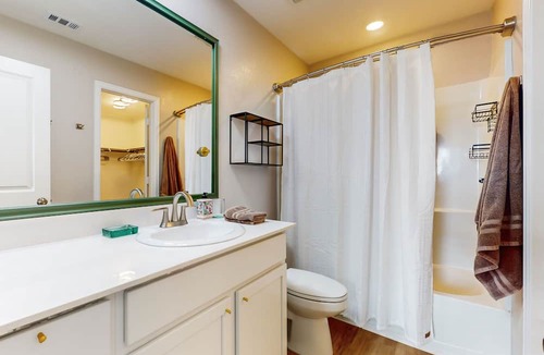 Willis House | Stylish & spacious getaway with large fenced yard & W/D - near lakes & golf