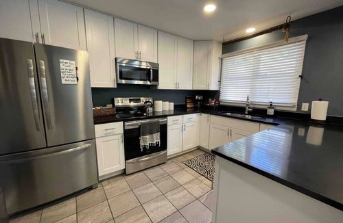 Greeley House | Large, beautifully updated townhome close to UNC and NCMC.
