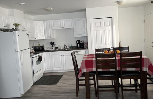 Brandon Apartment | Comfortable Stickney bedroom.