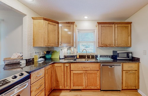 Seneca House | Dog-friendly home near Clemson with tree-lined yard, patio & deck