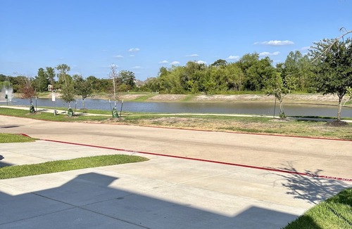 Wellborn House | SweetStay TX | Free TESLA Charging | Pond views | Walking trails