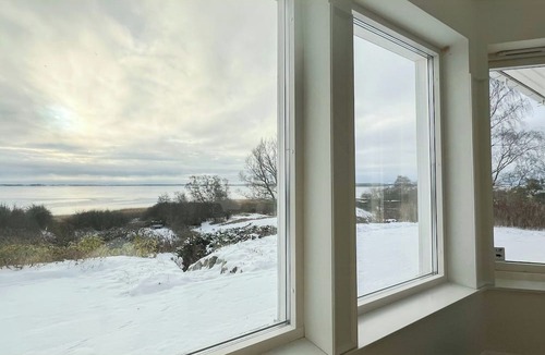 Ramlose House | Swedish timber house overlooking Lake Arresø