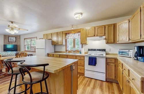 Friendship House | Cozy wooded duplex w/WiFi, full kitchen, shared W/D & near lakes & trails
