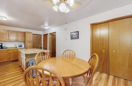 Friendship House | Cozy wooded duplex w/WiFi, full kitchen, shared W/D & near lakes & trails