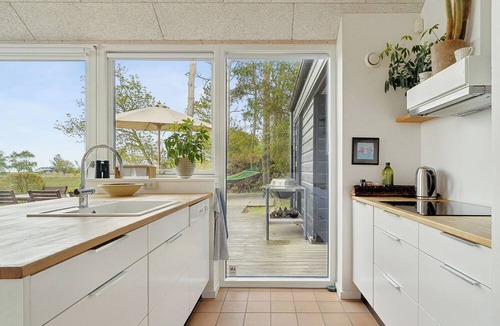 Ørsted House | Cozy low-energy home with sea views