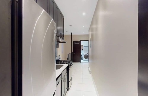 Manhattan Valley Apartment | Spacious 4BR 2BA duplex apt with private patio & WD