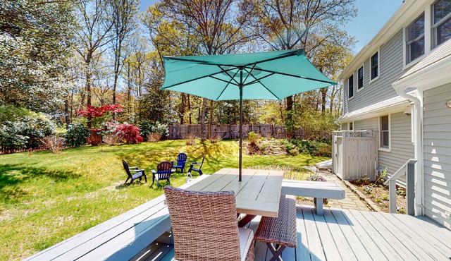 2-story home with outdoor shower, deck, firepit, grill, enclosed yard, & W/D