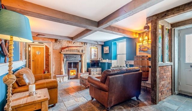 The Harbour Nook is a gorgeous ground floor, coastal apartment situated at the harbour’s edge with l