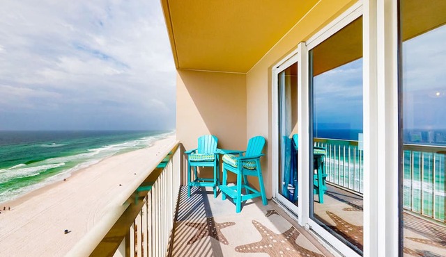Colorful, waterfront condo with pools, gym, & beach access