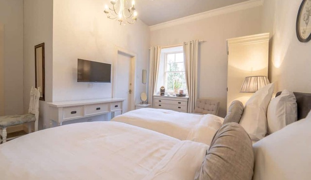 The Orchid Suite room with garden views