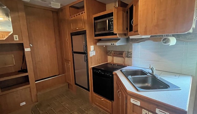 Cozy Camper at Rockwater Campground with all the amenities the campground offers