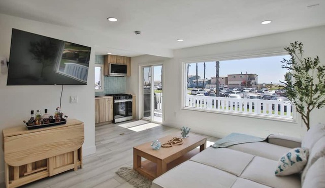 STEPS TO PRIVATE BEACH FRONT PANORAMIC OCEAN VIEWS! Home - parking lot - sand.