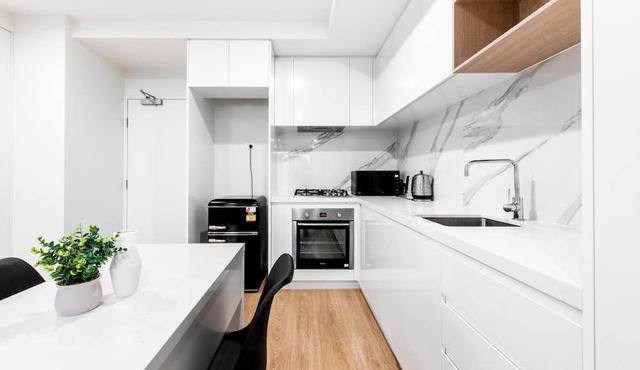 Workers Retreat Across from Essendon Station