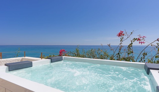 Charming Costa Blanca Villa | Villa Robero | 3 Bedrooms | Beachfront | Spectacular Sea Views | Spacious Furnished Sun Terrace with Private Hot Tub | BBQ facilities | Outdoor Dining Area | Villajoyosa