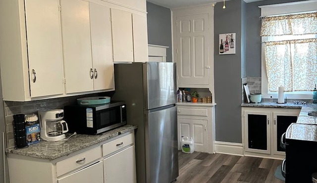 Spacious 4-bedroom home in charming historic Hagerstown, featuring WiFi and AC.