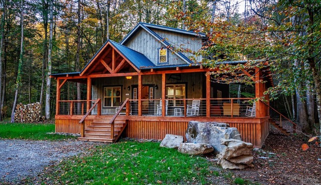 Secluded cabin beside private river, surrounded by peaceful nature