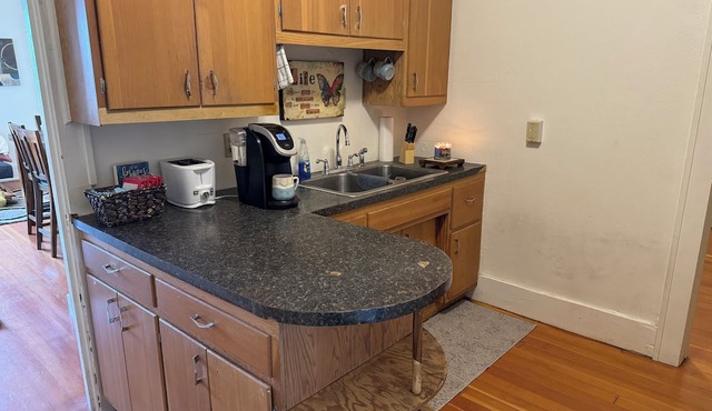 Cozy 2-bedroom apartment with WiFi, AC in downtown Miller with rooftop patio.