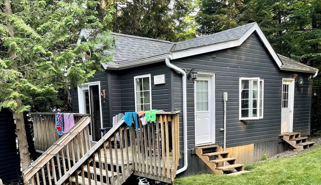 Lakefront 2 cottage property with large private dock. Recently renovated.