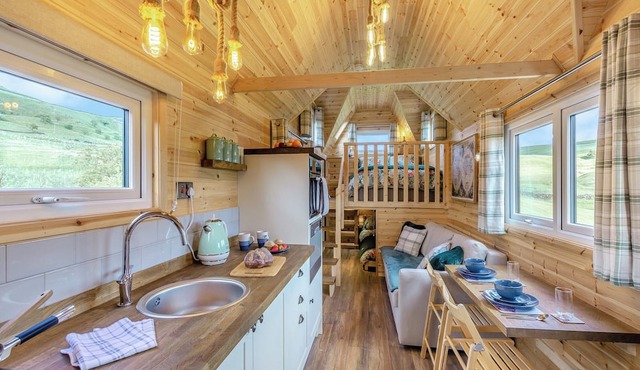 The Tiny House is set within acres of rolling countryside.
