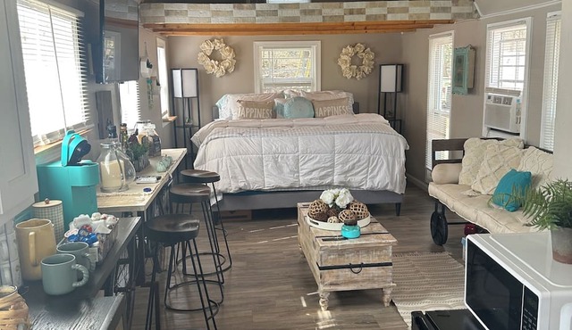 Country Farm Bliss is a rustic tiny home located on Farm.