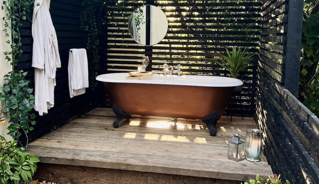 Luxury village cottage; outdoor tub; country views