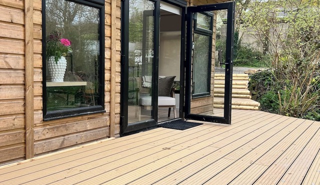 The Mill Lodge luxury and cosy in a tranquil garden setting.