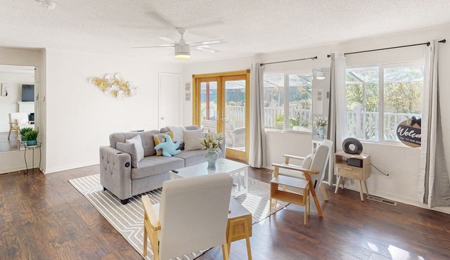 Dog-friendly lake view getaway with a full kitchen, sunroom