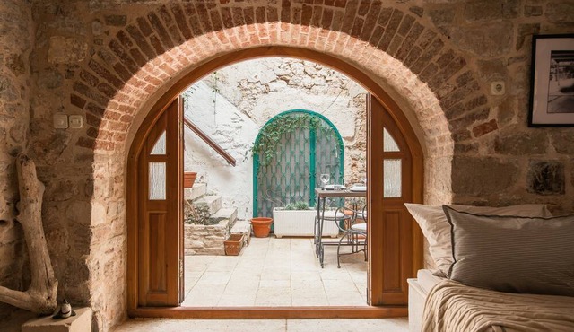 Pharos Stone Retreat | Historic Courtyard Cottage