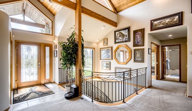 Vast countryside house with wide-ranging views, double deck, bar, & fireplaces