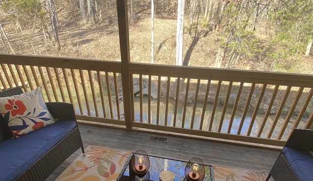 A serene hideaway nestled by the babbling brook and only minutes to downtown!