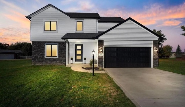 Like new 4 bedroom 2.5 bath home with boat slip on Lake Wawasee, IN. Sleeps 11+