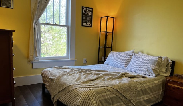 Bright and cozy space to rest in the heart of Hattiesburg.