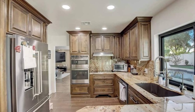 Fun & cozy North Scottsdale home with a stunning backyard oasis